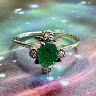 Emerald and Diamond Flower Ring18ct White Gold.